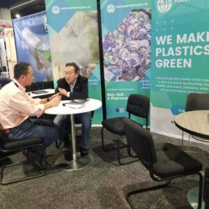 Plastic Recycling Conference in Maryland on March 6-8, 2023 Dr. Steve Wong Conversing at the Booth