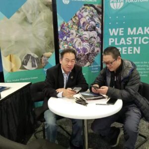 Plastic Recycling Conference in Maryland on March 6-8, 2023 Dr. Steve Wong Conversing at the Booth